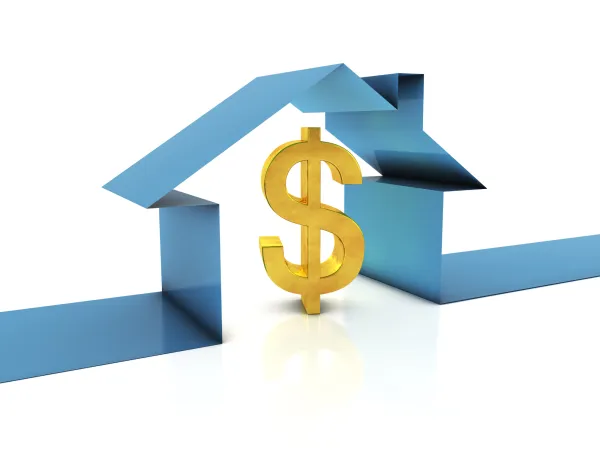 A golden dollar sign stands between blue house outlines, symbolizing real estate investment and financial value.